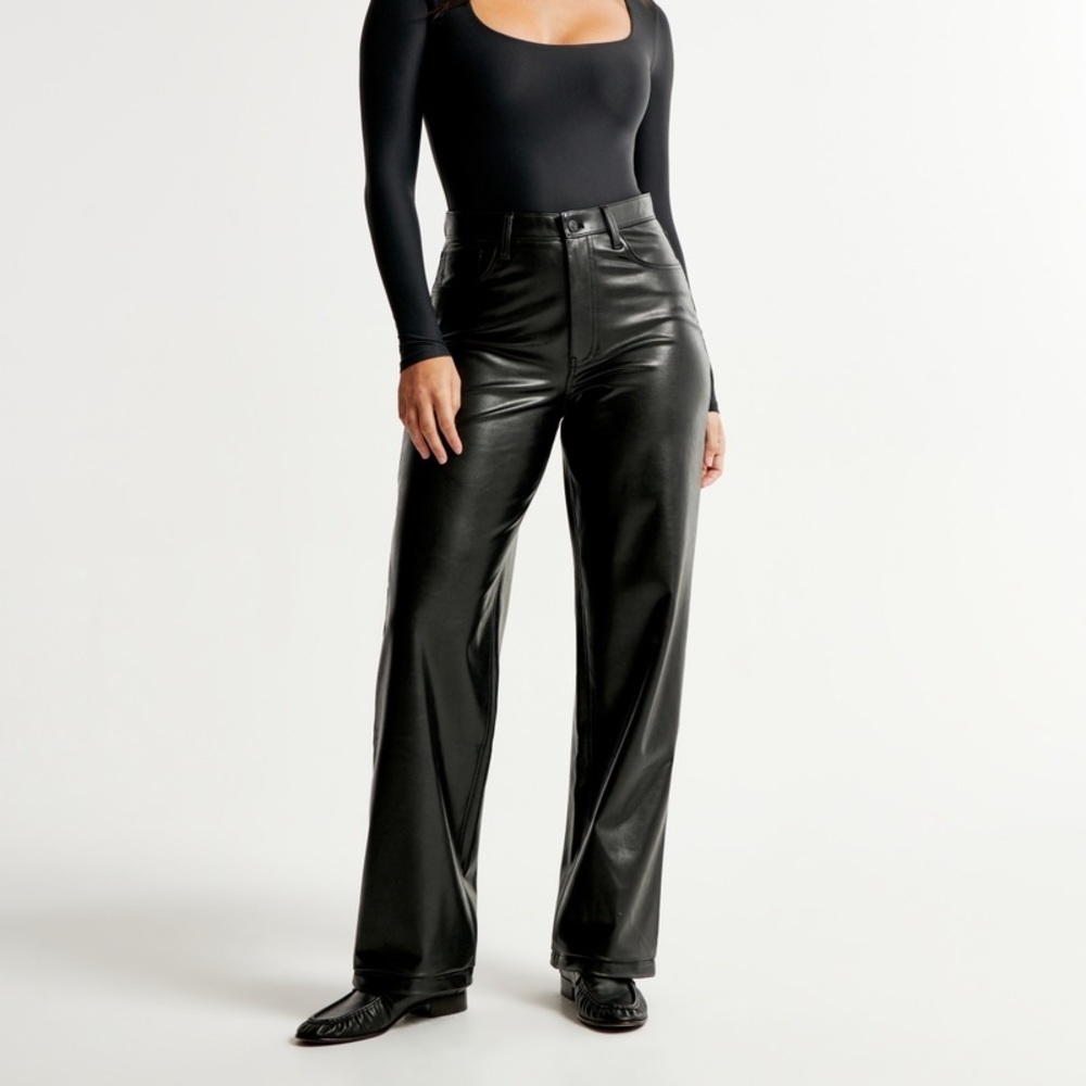 Criss-Cross waistband vegan Leather 90’s high rise straight leg pant. Never worn